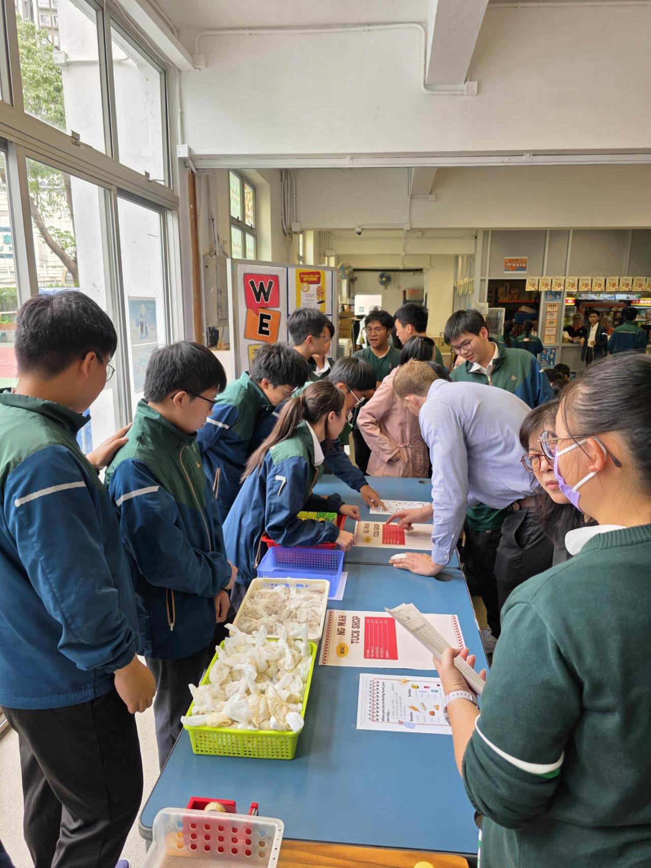 Ng Wah Tuck Shop: Students bought snacks using English at recess.